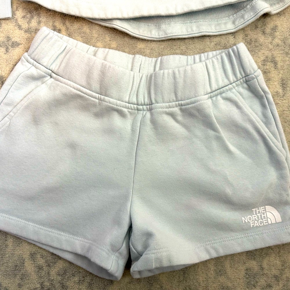 The North Face girls light blue shorts in sweatshirt material